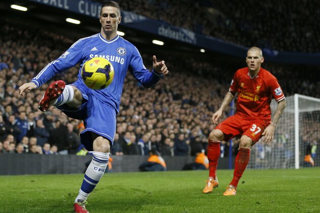 Chelsea's Fernando Torres, left, controls the ball watched by Liverpool's Martin Skrtel during the English Premier League soccer match between Chelsea and Liverpool at Stamford Bridge Stadium in London, Sunday, Dec. 29, 2013. (AP Photo/Kirsty Wigglesworth) Chelsea's Fernando Torres, left, controls the ball watched by Liverpool's Martin Skrtel during the English Premier League soccer match between Chelsea and Liverpool at Stamford Bridge Stadium in London, Sunday, Dec. 29, 2013. (AP Photo/Kirsty Wigglesworth)