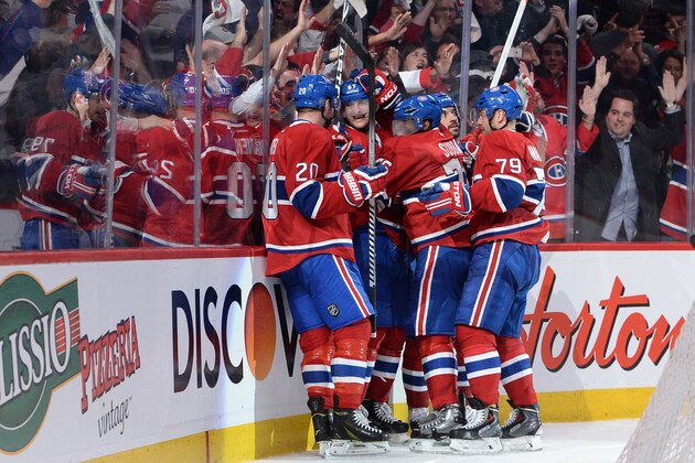 MONTREAL, QC - APRIL 22: Max Pacioretty #67 of the Montreal Canadiens celebrates with teammates Thomas Vanek #20, Andrei Markov #79 and P.K. Subban #76 after scoring the winning goal against the Tampa Bay Lightning in Game Four of the First Round of the 2014 Stanley Cup Playoffs on April 22, 2014 at the Bell Centre in Montreal, Quebec, Canada. (Photo by Francois Lacasse/NHLI via Getty Images)