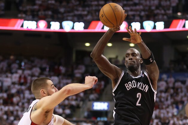 Apr 19, 2014; Toronto, Ontario, CAN; Brooklyn Nets forward Kevin Garnett (2) passes against the Toronto Raptors in game one during the first round of the 2014 NBA Playoffs at Air Canada Centre. The Nets beat the Raptors 94-87. Mandatory Credit: Tom Szczerbowski-USA TODAY Sports Apr 19, 2014; Toronto, Ontario, CAN; Brooklyn Nets forward Kevin Garnett (2) passes against the Toronto Raptors in game one during the first round of the 2014 NBA Playoffs at Air Canada Centre. The Nets beat the Raptors 94-87. Mandatory Credit: Tom Szczerbowski-USA TODAY Sports