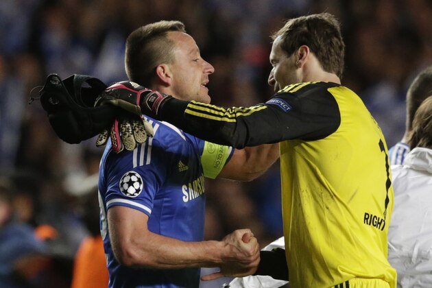 Chelsea's John Terry, left goes to hug Chelsea goalkeeper Petr Cech after Chelsea defeated Paris Saint-Germain in the Champions League quarterfinal second leg soccer match between Chelsea and Paris Saint Germain at Stamford Bridge stadium in London, Tuesday, April 8, 2014. Chelsea advance to the semifinals. (AP Photo/Matt Dunham). Chelsea's John Terry, left goes to hug Chelsea goalkeeper Petr Cech after Chelsea defeated Paris Saint-Germain in the Champions League quarterfinal second leg soccer match between Chelsea and Paris Saint Germain at Stamford Bridge stadium in London, Tuesday, April 8, 2014. Chelsea advance to the semifinals. (AP Photo/Matt Dunham).