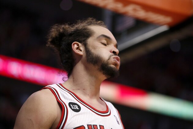 Chicago Bulls center Joakim Noah exhales during the closing second of the overtime period of Game 2 in an opening-round NBA basketball playoff series against the Washington Wizards Tuesday, April 22, 2014, in Chicago. The Wizards won 101-99. (AP Photo/Charles Rex Arbogast)