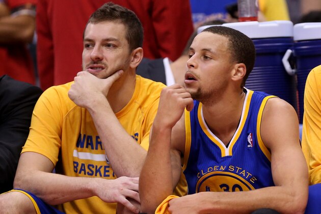 LOS ANGELES, CA - APRIL 21:  Stephen Curry #30(R) and David Lee #10 of the Golden State Warriors sit out the fourth quarter against the Los Angeles Clippers in Game Two of the Western Conference Quarterfinals during the 2014 NBA Playoffs at Staples Center on April 21, 2014 in Los Angeles, California. The Clippers won 138-98.  NOTE TO USER: User expressly acknowledges and agrees that, by downloading and or using this photograph, User is consenting to the terms and conditions of the Getty Images License Agreement.  (Photo by Stephen Dunn/Getty Images)
