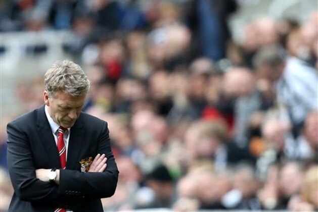 FILE - This Saturday, April 5, 2014 file photo shows Manchester United's manager David Moyes during their English Premier League soccer match against Newcastle United at St James' Park, Newcastle, England. Moyes was fired as Manchester United manager on Tuesday, April 22, 2014, paying the price for the club's spectacular and sudden decline in his 10 months in charge since replacing Alex Ferguson.(AP Photo/Scott Heppell, File)