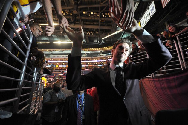 LOS ANGELES, CA - APRIL 13: Pau Gasol #16 of the Los Angeles Lakers leaves the arena after a game against the Memphis Grizzlies at Staples Center on April 13, 2014 in Los Angeles, California. NOTE TO USER: User expressly acknowledges and agrees that, by downloading and/or using this Photograph, user is consenting to the terms and conditions of the Getty Images License Agreement. Mandatory Copyright Notice: Copyright 2014 NBAE (Photo by Andrew D. Bernstein/NBAE via Getty Images)
