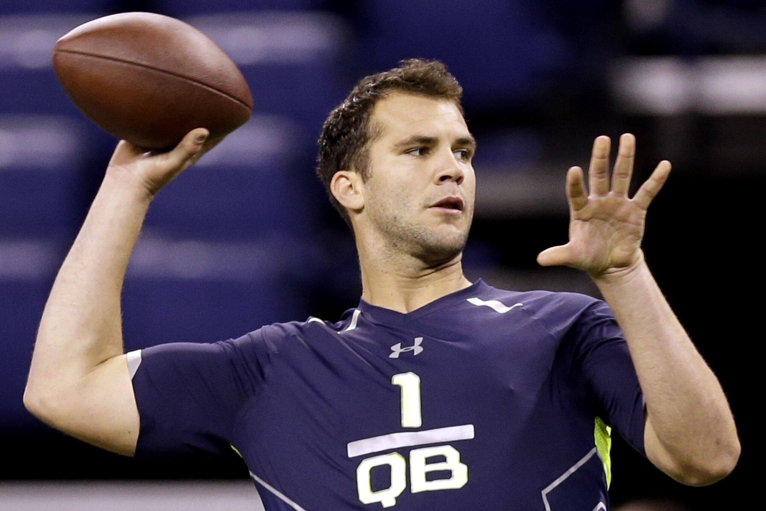 Central Florida quarterback Blake Bortles runs a drill at the NFL football scouting combine in Indianapolis, Sunday, Feb. 23, 2014. (AP Photo/Nam Y. Huh)