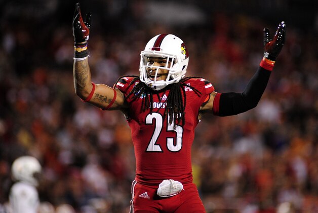Dec 28, 2013; Orlando, FL, USA; Louisville Cardinals safety Calvin Pryor (25) waves his arms to the crowd in the fourth quarter as theCardinals beat the Miami Hurricanes 36-9 to win the Russell Athletic Bowl at Florida Citrus Bowl Stadium. Mandatory Credit: David Manning-USA TODAY Sports