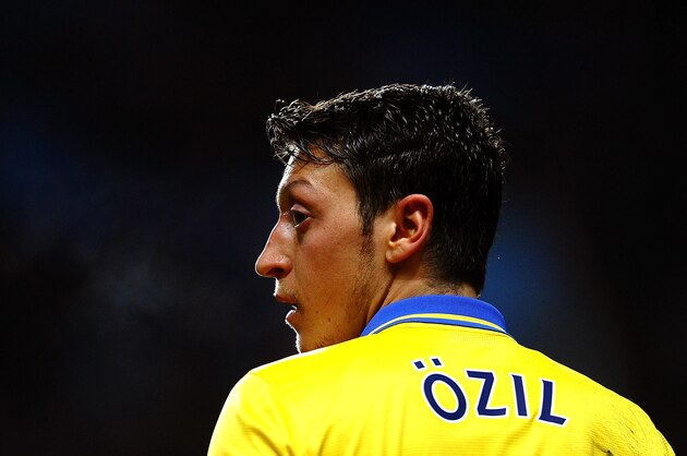 BIRMINGHAM, ENGLAND - JANUARY 13:  Mesut Oezil of Arsenal looks on during the Barclays Premier League match between Aston Villa and Arsenal at Villa Park on January 13, 2014 in Birmingham, England.  (Photo by Laurence Griffiths/Getty Images)
