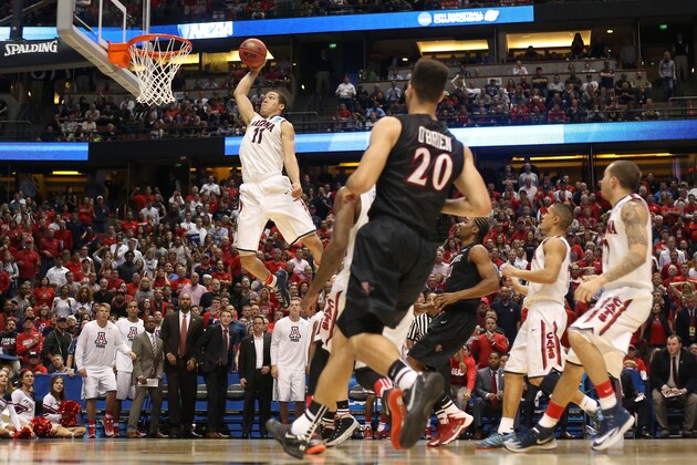 ANAHEIM, CA - MARCH 27:  Aaron Gordon #11 of the Arizona Wildcats dunks the ball in the second half while taking on the San Diego State Aztecs during the regional semifinal of the 2014 NCAA Men's Basketball Tournament at the Honda Center on March 27, 2014 in Anaheim, California.  (Photo by Jeff Gross/Getty Images)