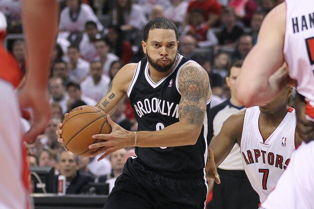 TORONTO, ON - APRIL 19:  Deron Williams #8 of the Brooklyn Nets drives with the ball against the Toronto Raptors in Game One of the NBA Eastern Conference play-off at the Air Canada Centre on April 19, 2014 in Toronto, Ontario, Canada. The Nets defeated the Raptors 94-87 to take a 1-0 series lead. NOTE TO USER: user expressly acknowledges and agrees that, by downloading and/or using this Photograph, user is consenting to the terms and conditions of the Getty Images License Agreement. (Photo by Claus Andersen/Getty Images)