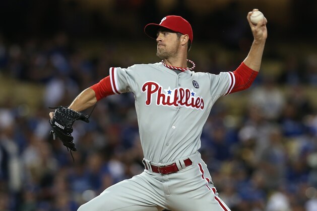 Philadelphia Phillies starting pitcher Cole Hamels throws against the Los Angeles Dodgers during the first inning of a baseball game on Wednesday, April 23, 2014, in Los Angeles. (AP Photo/Jae C. Hong)