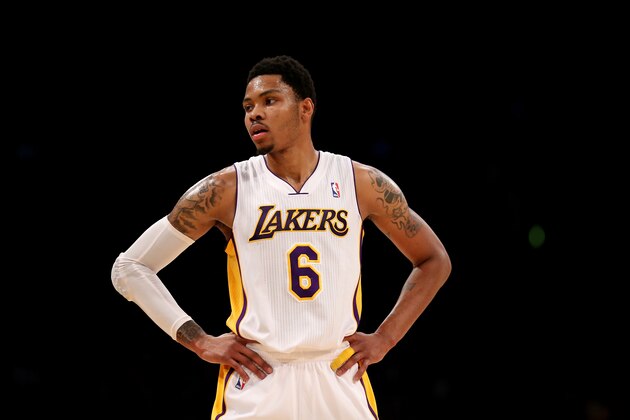 LOS ANGELES, CA - MARCH 30:  Kent Bazemore #6 of the Los Angeles Lakers stands o nthe court in the game with the Phoenix Suns at Staples Center on March 30, 2014 in Los Angeles, California. NOTE TO USER: User expressly acknowledges and agrees that, by downloading and or using this photograph, User is consenting to the terms and conditions of the Getty Images License Agreement.  (Photo by Stephen Dunn/Getty Images)
