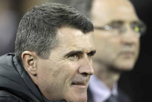 Republic of Ireland assistant manager Roy Keane, left, and manager Martin O'Neill, right, watch their team play against Latvia during a soccer International at the Aviva Stadium, Dublin, Ireland, Friday, Nov. 15, 2013.  (AP Photo/Peter Morrison)