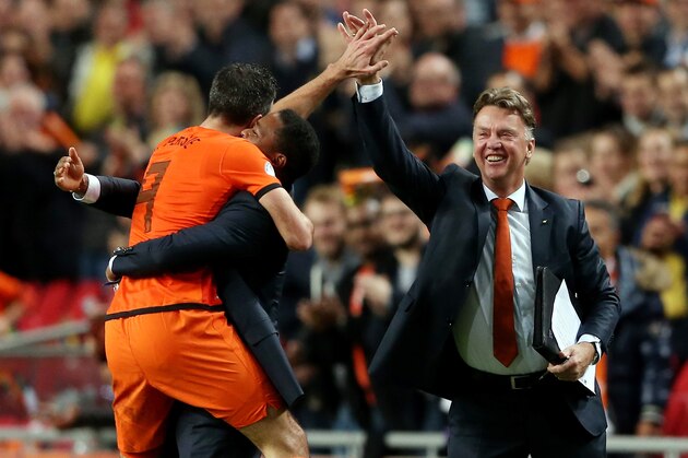AMSTERDAM, NETHERLANDS - OCTOBER 11:  Robin van Persie of Holland celebrates with Patrick Kluivert and manager Luis van Gaal after scoring their fourth goal during the FIFA 2014 World Cup Qualifing match between Holland and Hungary at Amsterdam Arena on October 11, 2013 in Amsterdam, Netherlands.  (Photo by Scott Heavey/Getty Images)