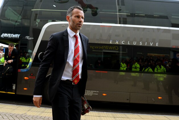 CARDIFF, WALES - NOVEMBER 24:  Ryan Giggs of Manchester United steps off the team coach prior to kickoff during the Barclays Premier League match between Cardiff City and Manchester United at Cardiff City Stadium on November 24, 2013 in Cardiff, Wales.  (Photo by Mike Hewitt/Getty Images)