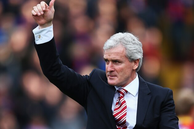 LONDON, ENGLAND - JANUARY 18:  Mark Hughes, manager of Stoke City gives the thumbs up as he walks out during the Barclays Premier League match between Crystal Palace and Stoke City at Selhurst Park on January 18, 2014 in London, England.  (Photo by Paul Gilham/Getty Images)