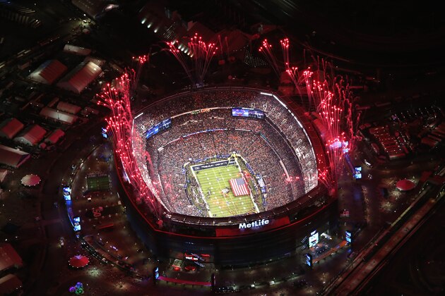 EAST RUTHERFORD, NJ - FEBRUARY 02:  Fireworks erupt over Metlife Stadium ahead of Super Bowl XLVIII between the Seattle Seahawks and the Denver Broncos on February 2, 2014 in East Rutherford, New Jersey. More than 80,000 fans were expected to fill the stadium for the first Super Bowl to be played in an outdoor stadium in a cold weather city.  (Photo by John Moore/Getty Images)