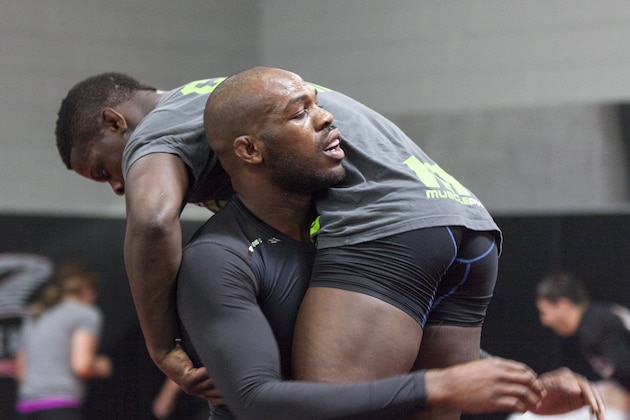 ALBUQUERQUE, NM - APRIL 2: UFC lightweight champion Jon 'Bones' Jones joins in for a warm up during an open training session for fans and media at the Jackson's Mixed Martial Arts and Fitness on April 2, 2014 in Albuquerque, New Mexico. (Photo by Aaron Sweet/Getty Images)