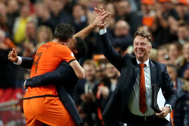AMSTERDAM, NETHERLANDS - OCTOBER 11: Robin van Persie of Holland celebrates with Patrick Kluivert and manager Luis van Gaal after scoring their fourth goal during the FIFA 2014 World Cup Qualifing match between Holland and Hungary at Amsterdam Arena on October 11, 2013 in Amsterdam, Netherlands. (Photo by Scott Heavey/Getty Images) AMSTERDAM, NETHERLANDS - OCTOBER 11: Robin van Persie of Holland celebrates with Patrick Kluivert and manager Luis van Gaal after scoring their fourth goal during the FIFA 2014 World Cup Qualifing match between Holland and Hungary at Amsterdam Arena on October 11, 2013 in Amsterdam, Netherlands. (Photo by Scott Heavey/Getty Images)