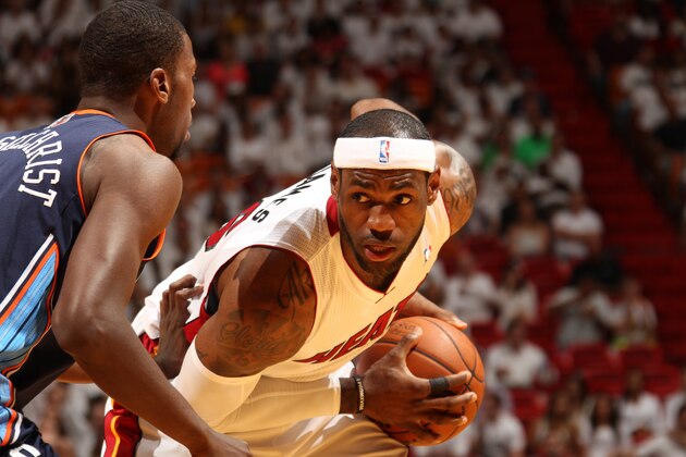 MIAMI, FL - April 23: LeBron James #6 of the Miami Heat looks to pass the ball against the Charlotte Bobcats during Game Two of the Eastern Conference Finals of the 2014 NBA playoffs at the American Airlines Arena in Miami, Florida on April 23, 2014. NOTE TO USER: User expressly acknowledges and agrees that, by downloading and/or using this photograph, user is consenting to the terms and conditions of the Getty Images License Agreement. Mandatory copyright notice: Copyright NBAE 2014 (Photo by Issac Baldizon/NBAE via Getty Images)
