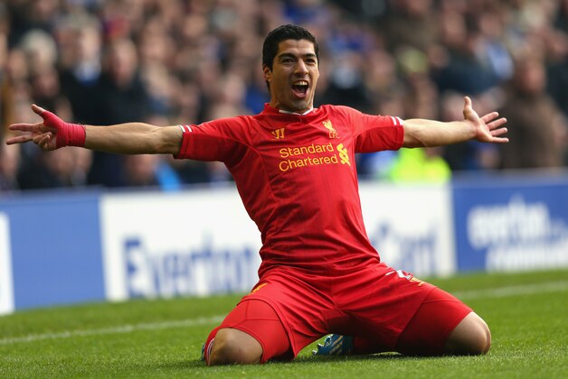 LIVERPOOL, ENGLAND - NOVEMBER 23:  Luis Suarez of Liverpool celebrates scoring his team's second goal during the Barclays Premier League match between Everton and Liverpool at Goodison Park on November 23, 2013 in Liverpool, England.  (Photo by Alex Livesey/Getty Images)