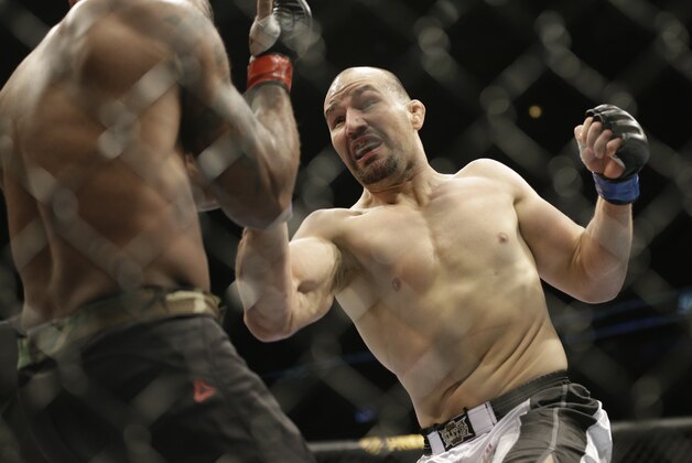 Glover Teixeira, right, fights Quinton Jackson during UFC Light Heavyweight Championship on FOX 6 at the United Center in Chicago, Saturday, Jan. 26, 2013. Teixeira won the bout. (AP Photo/Nam Y. Huh) Glover Teixeira, right, fights Quinton Jackson during UFC Light Heavyweight Championship on FOX 6 at the United Center in Chicago, Saturday, Jan. 26, 2013. Teixeira won the bout. (AP Photo/Nam Y. Huh)