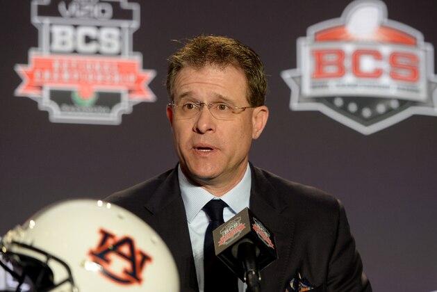 NEWPORT BEACH, CA - JANUARY 05: Auburn Tigers Head Coach Gus Malzahn speaks to media during a Vizio BCS National Championship press conference at the Newport Beach Marriot Hotel and Spa on January 5, 2014 in Newport Beach, California. (Photo by Harry How/Getty Images) NEWPORT BEACH, CA - JANUARY 05: Auburn Tigers Head Coach Gus Malzahn speaks to media during a Vizio BCS National Championship press conference at the Newport Beach Marriot Hotel and Spa on January 5, 2014 in Newport Beach, California. (Photo by Harry How/Getty Images)