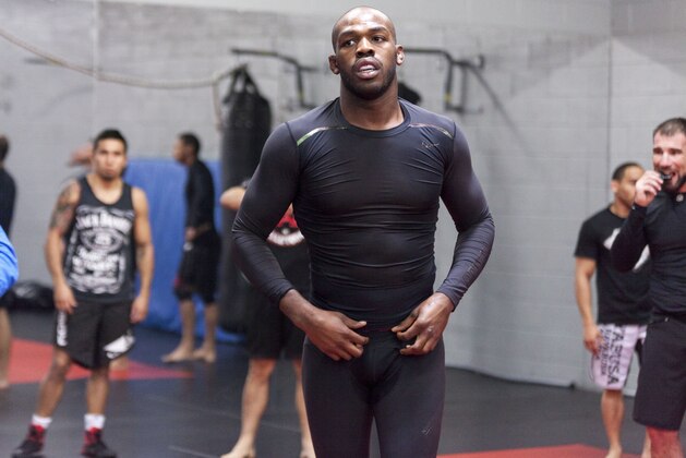 ALBUQUERQUE, NM - APRIL 2: UFC lightweight champion Jon 'Bones' Jones joins in for a warm up during an open training session for fans and media at the Jackson's Mixed Martial Arts and Fitness on April 2, 2014 in Albuquerque, New Mexico. (Photo by Aaron Sweet/Getty Images)