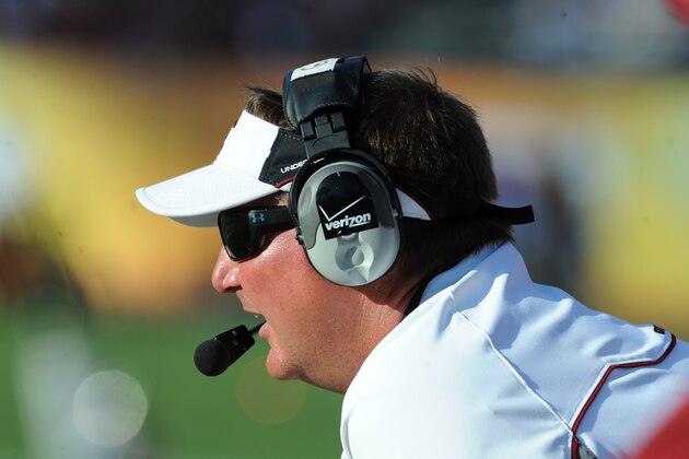 TAMPA, FL - JANUARY 01: Quarterbacks coach G. A. Mangus of the South Carolina Gamecocks watches play against the Michigan Wolverines in the Outback Bowl January 1, 2013 at Raymond James Stadium in Tampa, Florida. (Photo by Al Messerschmidt/Getty Images) TAMPA, FL - JANUARY 01: Quarterbacks coach G. A. Mangus of the South Carolina Gamecocks watches play against the Michigan Wolverines in the Outback Bowl January 1, 2013 at Raymond James Stadium in Tampa, Florida. (Photo by Al Messerschmidt/Getty Images)