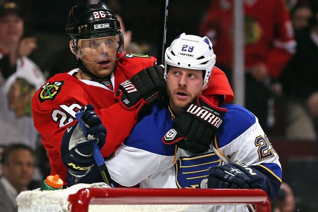 CHICAGO, IL - APRIL 21: Michal Handzus #26 of the Chicago Blackhawks grabs Steve Ott #29 of the St. Louis Blues around the neck during a stop in play at the Blackhawk net in Game Three of the First Round of the 2014 NHL Stanley Cup Playoffs at the United Center on April 21, 2014  in Chicago, Illinois. The Blackhawks defeated the Blues 2-0. (Photo by Jonathan Daniel/Getty Images)