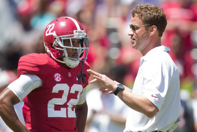 Apr 19, 2014; Tuscaloosa, AL, USA;  Alabama Crimson Tide offensive coordinator/quarterbacks coach Lane Kiffin talks to wide receiver Christion Jones (22) prior to the A-Day game at Bryant-Denny Stadium. Mandatory Credit: Marvin Gentry-USA TODAY Sports