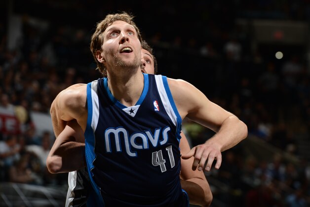SAN ANTONIO, TX - APRIL 23: Dirk Nowitzki #41 of the Dallas Mavericks battles for position against the San Antonio Spurs during Game One of the Western Conference Quarterfinals of the 2014 NBA Playoffs on April 23, 2014 at the AT&T Center in San Antonio, Texas. NOTE TO USER: User expressly acknowledges and agrees that, by downloading and/or using this Photograph, user is consenting to the terms and conditions of the Getty Images License Agreement. Mandatory Copyright Notice: Copyright 2014 NBAE (Photo by Garrett W. Ellwood/NBAE via Getty Images)