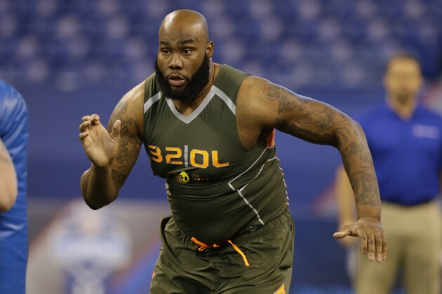 Virginia offensive lineman Morgan Moses runs a drill at the NFL football scouting combine in Indianapolis, Saturday, Feb. 22, 2014. (AP Photo/Michael Conroy) Virginia offensive lineman Morgan Moses runs a drill at the NFL football scouting combine in Indianapolis, Saturday, Feb. 22, 2014. (AP Photo/Michael Conroy)