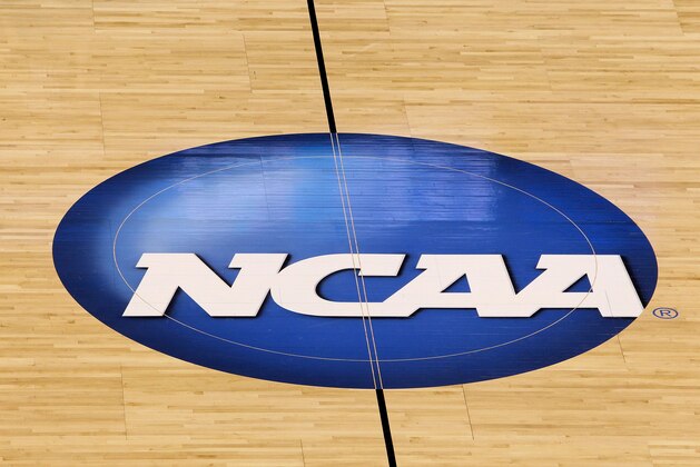 OKLAHOMA CITY - MARCH 20:  A detail of a NCAA logo  decal is seen at center court as the Kansas State Wildcats play against the Brigham Young Cougars during the second round of the 2010 NCAA men's basketball tournament at Ford Center on March 20, 2010 in Oklahoma City, Oklahoma.  (Photo by Ronald Martinez/Getty Images)