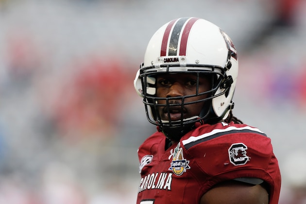 ORLANDO, FL - JANUARY 01:  Jadeveon Clowney #7 of the South Carolina Gamecocks works out on the field before the start of their game against the Wisconsin Badgers at the Capital One Bowl on January 1, 2014 in Orlando, Florida.  (Photo by Scott Halleran/Getty Images)