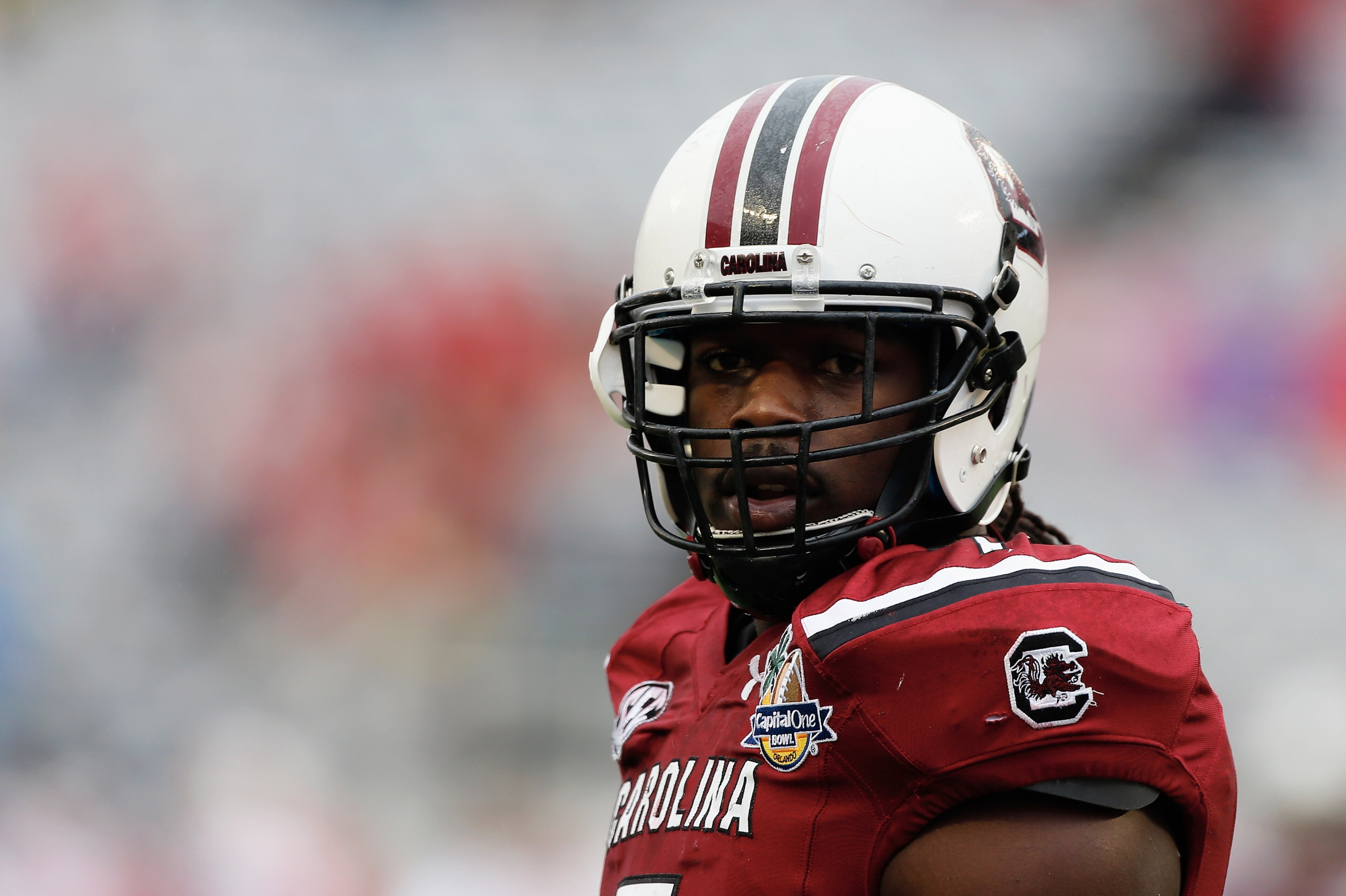ORLANDO, FL - JANUARY 01:  Jadeveon Clowney #7 of the South Carolina Gamecocks works out on the field before the start of their game against the Wisconsin Badgers at the Capital One Bowl on January 1, 2014 in Orlando, Florida.  (Photo by Scott Halleran/Getty Images)