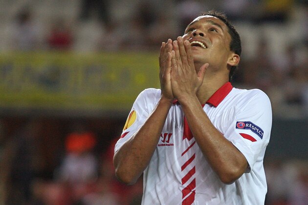 Sevilla's Carlos Bacca, celebrates after scoring a goal during a Europa League group H soccer match against Freiburg at the Ramon Sanchez Pizjuan stadium in Sevilla, Spain, Thursday, Oct. 3, 2013.  (AP Photo/Toni Rodriguez)