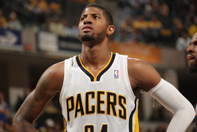 INDIANAPOLIS - APRIL 22  : Paul George #24 of the Indiana Pacers looks on against the Atlanta Hawks in the East Conference Quarter Finals Game Two at Bankers Life Fieldhouse on April 22 2014 in Indianapolis, Indiana.  NOTE TO USER: User expressly acknowledges and agrees that, by downloading and or using this Photograph, user is consenting to the terms and condition of the Getty Images License Agreement. Mandatory Copyright Notice: 2014 NBAE  (Photo by Ron Hoskins/NBAE via Getty Images)