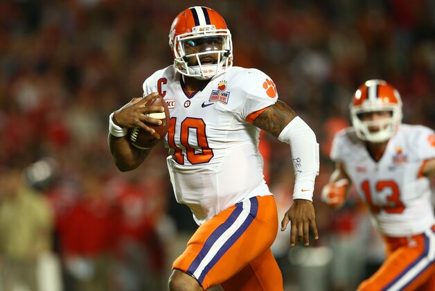 MIAMI GARDENS, FL - JANUARY 03:  Tajh Boyd #10 of the Clemson Tigers runs for a touchdown in the first half against the Ohio State Buckeyes during the Discover Orange Bowl at Sun Life Stadium on January 3, 2014 in Miami Gardens, Florida.  (Photo by Streeter Lecka/Getty Images)