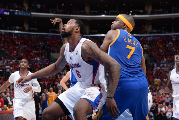 LOS ANGELES, CA - APRIL 19: DeAndre Jordan #6 of the Los Angeles Clippers battles for rebound position during Game One of the Western Conference Quarterfinals of the NBA Playoffs against the Golden State Warriors at STAPLES Center on April 19, 2014 in Los Angeles, California. NOTE TO USER: User expressly acknowledges and agrees that, by downloading and/or using this Photograph, user is consenting to the terms and conditions of the Getty Images License Agreement. Mandatory Copyright Notice: Copyright 2014 NBAE (Photo by Andrew D. Bernstein/NBAE via Getty Images)
