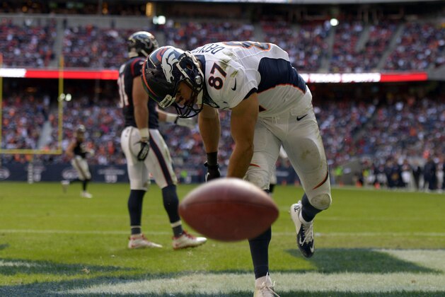 Dec 22, 2013; Houston, TX, USA; Denver Broncos wide receiver Eric Decker (87) spikes the football after scoring a touchdown against the Houston Texans during the second half at Reliant Stadium. The Broncos won 37-13. Mandatory Credit: Thomas Campbell-USA TODAY Sports