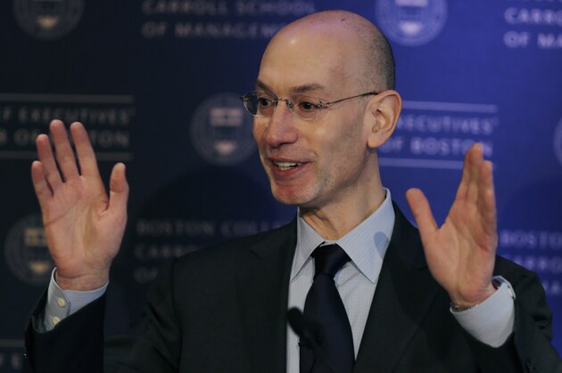 NBA commissioner Adam Silver gestures during an address, Wednesday, March 12, 2014, in Boston. Silver commented on some teams with losing records NBA commissioner Adam Silver gestures during an address, Wednesday, March 12, 2014, in Boston. Silver commented on some teams with losing records