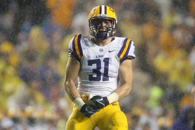 Sep 21, 2013; Baton Rouge, LA, USA; LSU Tigers linebacker D.J. Welter (31) celebrates a tackle against the Auburn Tigers in the first quarter at Tiger Stadium. Mandatory Credit: Crystal LoGiudice-USA TODAY Sports