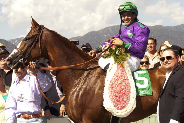 In a photo provided by Benoit Photo, California Chrome and jockey Victor Espinoza pose in the winner's circle after victory in the Santa Anita Derby horse race Saturday, April 5, 2014, at Santa Anita in Arcadia, Calif. (AP Photo/Benoit Photo) In a photo provided by Benoit Photo, California Chrome and jockey Victor Espinoza pose in the winner's circle after victory in the Santa Anita Derby horse race Saturday, April 5, 2014, at Santa Anita in Arcadia, Calif. (AP Photo/Benoit Photo)