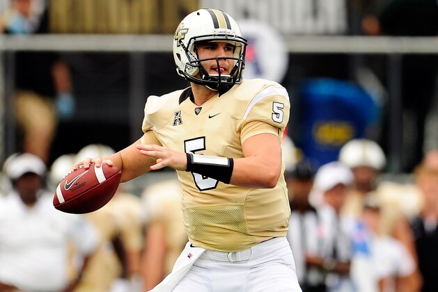 ORLANDO, FL - SEPTEMBER 28:  Blake Bortles #5 of the Central Florida Knights drops back to pass against the South Carolina Gamecocks during a game at Bright House Networks Stadium on September 28, 2013 in Orlando, Florida.  (Photo by Stacy Revere/Getty Images)