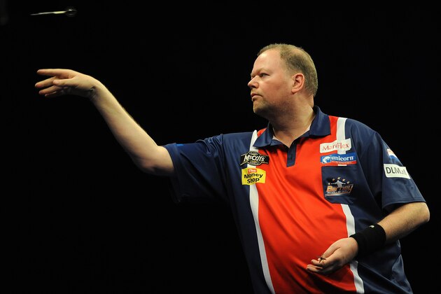 LONDON, ENGLAND - MAY 16: Raymond Van Barneveld of Holland in action during his semi final match against Phill Taylor of England during the McCoy's Premier League Darts Play-Offs at The O2 Arena on May 16, 2013 in London, England. (Photo by Charlie Crowhurst/Getty Images)