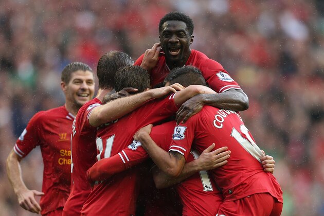 LIVERPOOL, ENGLAND - AUGUST 17:  Daniel Sturridge of Liverpool is congratulated by Iago Aspas,Lucas,Philuppe Coutinho and Kolo Toure after scoring the first goal during the Barclays Premier League match between Liverpool and Stoke City at Anfield on August 17, 2013 in Liverpool, England.  (Photo by Clive Brunskill/Getty Images)
