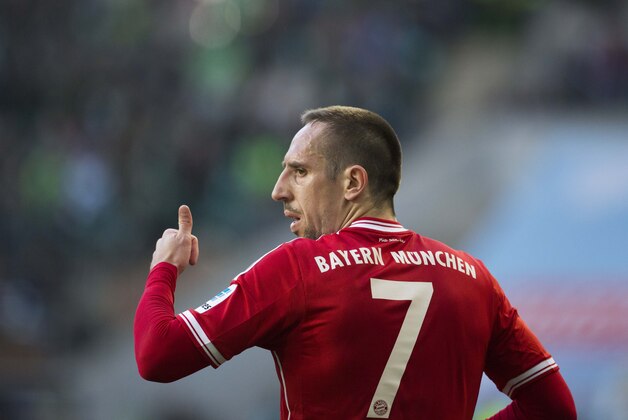 Bayern's Franck Ribery of France gestures during the German Bundesliga soccer match between VfL Wolfsburg and Bayern Munich in Wolfsburg, Germany, Saturday, March 8, 2014. (AP Photo/Gero Breloer) 