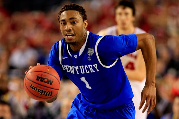 ARLINGTON, TX - APRIL 05: James Young #1 of the Kentucky Wildcats brings the ball up the floor during the NCAA Men's Final Four Semifinal against the Wisconsin Badgers at AT&T Stadium on April 5, 2014 in Arlington, Texas.  (Photo by Jamie Squire/Getty Images)