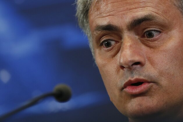 Chelsea's coach Jose Mourinho from Portugal speaks during a press conference at the Vicente Calderon stadium, in Madrid, Spain, Monday April 21, 2014, ahead of the Champions League semifinal first leg soccer match against Atletico Madrid on Tuesday. (AP Photo/Andres Kudacki)