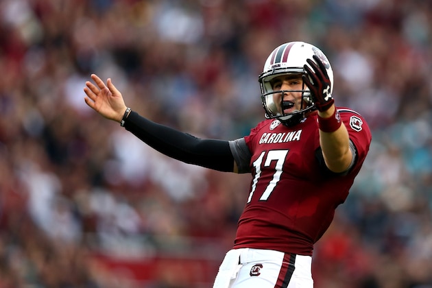 COLUMBIA, SC - NOVEMBER 23:  Dylan Thompson #17 of the South Carolina Gamecocks celebrates after a touchdown during their game against the Coastal Carolina Chanticleers at Williams-Brice Stadium on November 23, 2013 in Columbia, South Carolina.  (Photo by Streeter Lecka/Getty Images)